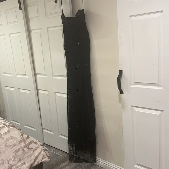 Size 12 catwalk couture . I’m size 8 and the dress fits me perfectly. - Picture 4 of 4